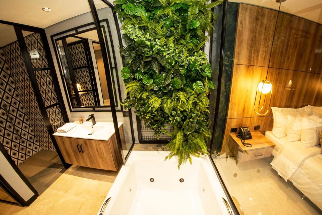 Cavalta By Bernalo Hotels Medellín Exterior foto A bathroom in a hotel